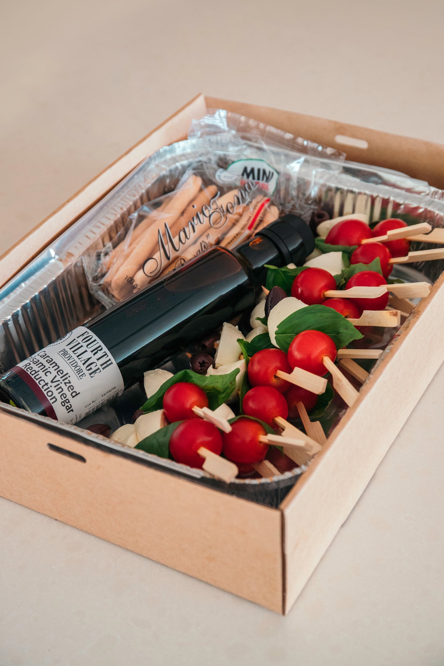 Caprese & Olive Skewers with Caramellised Balsamic & Italian Bread Sticks